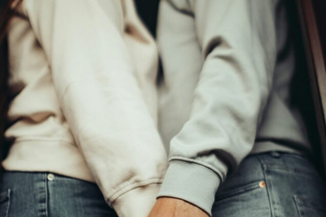 Couple holding hands